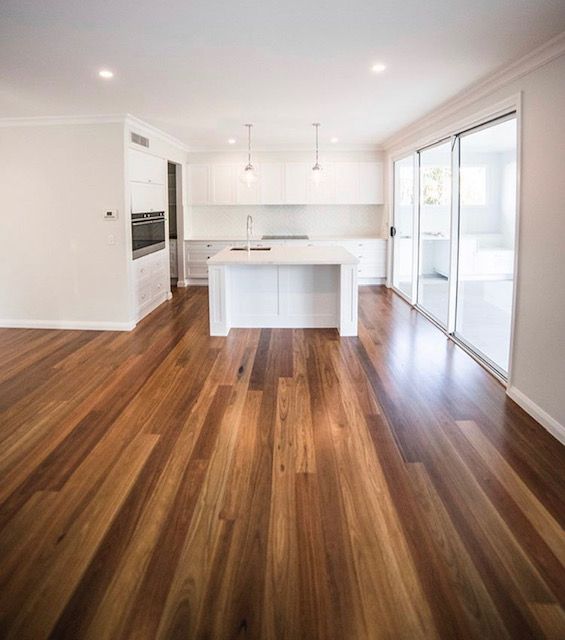 Modern kitchen with timber floor boards | Featured image for timber supplies Brisbane home page.