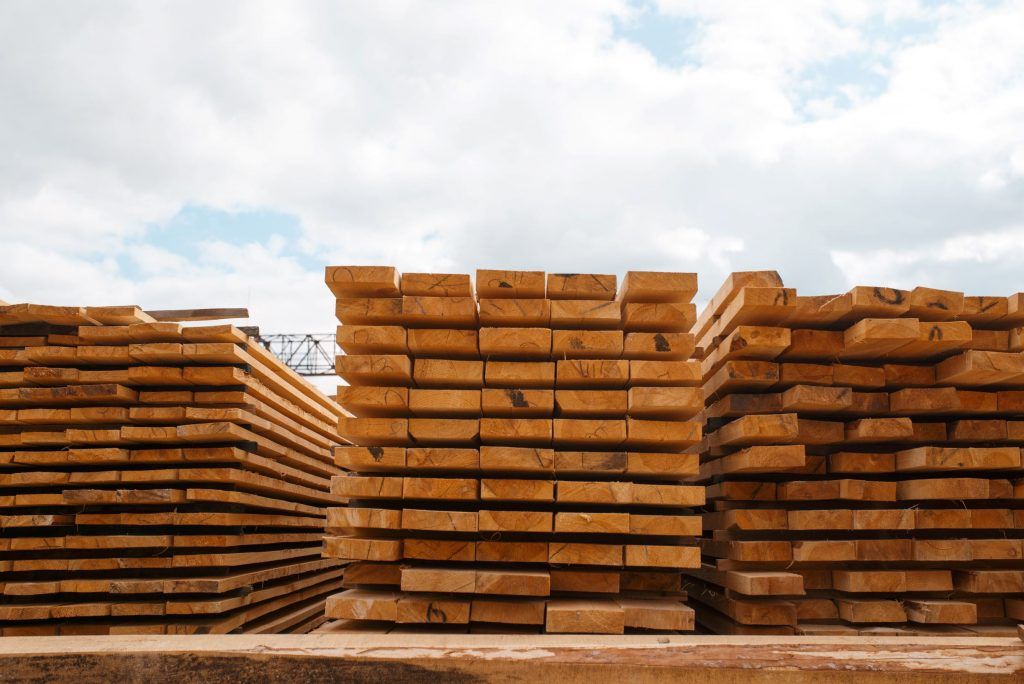 Timber boards air drying in stacks | Featured image for timber supplies Brisbane home page.