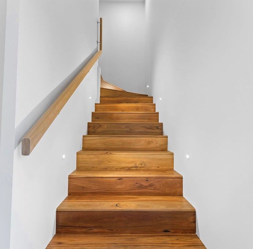 Photo of wooden spotted gum stairs | Featured Image for the Decking Timber Page of Versace Timbers.